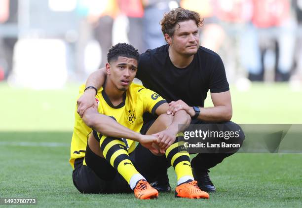 Jude Bellingham and Edin Terzic, Head Coach of Borussia Dortmund, look dejected following the team's draw, as they finish second in the Bundesliga...