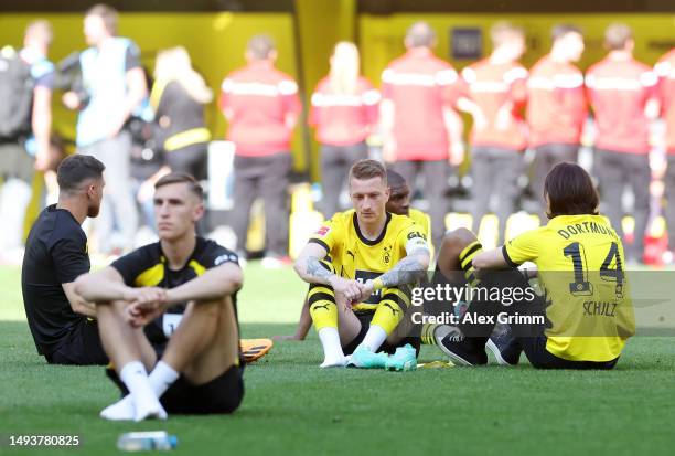 Marco Reus of Borussia Dortmund looks dejected following the team's draw, as they finish second in the Bundesliga behind FC Bayern Munich during the...