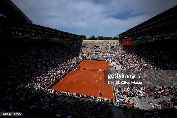 Carlos Alcaraz of Spain in action during a practice match on the remodeled Court Suzanne-Lenglen ahead of the French Open Tennis at Roland Garros on...