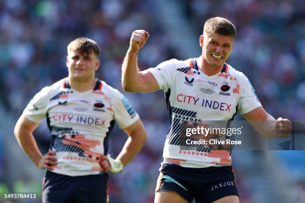 Owen Farrell of Saracens celebrates a try by Ivan Van Zyl of Saracens after a TMO review during the Gallagher Premiership Final between Saracens and...