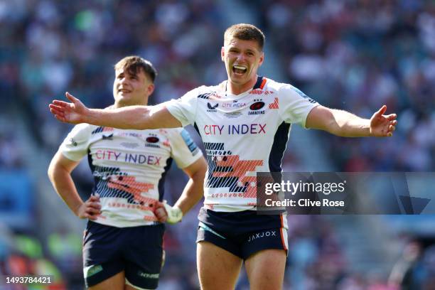 Owen Farrell of Saracens celebrates a try by Ivan Van Zyl of Saracens after a TMO review during the Gallagher Premiership Final between Saracens and...