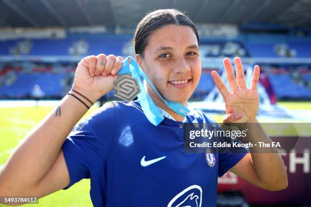 Sam Kerr of Chelsea celebrates with the Barclays Women's Super League winners medal after the team's victory during the FA Women's Super League match...