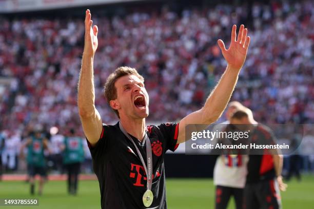 Thomas Mueller of FC Bayern Munich celebrate winning the Bundesliga title following victory in the Bundesliga match between 1. FC Köln and FC Bayern...