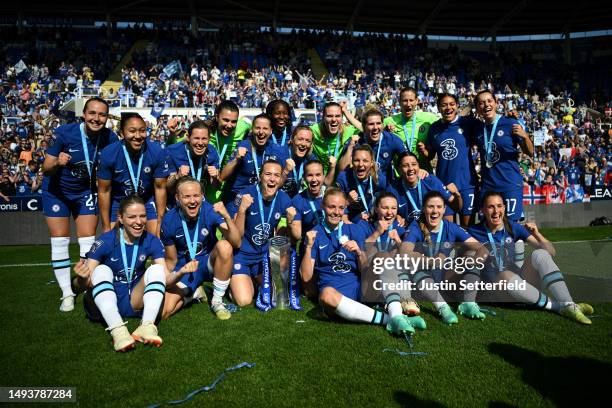 Chelsea players celebrate with the Barclays Women's Super League trophy after the team's victory during the FA Women's Super League match between...