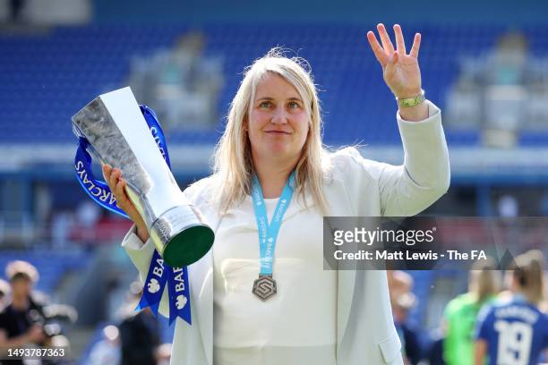 Emma Hayes, Manager of Chelsea, lifts the Barclays Women's Super League trophy after the team's victory during the FA Women's Super League match...