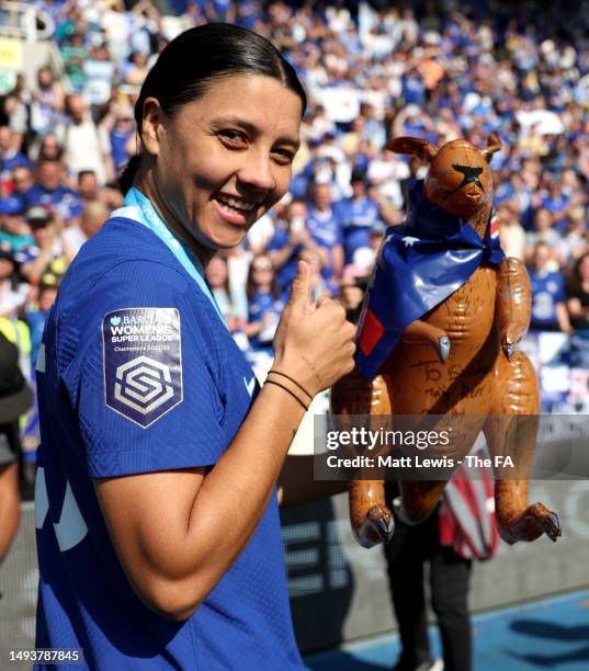 Sam Kerr of Chelsea poses for a photo with a toy kangaroo after the team's victory during the FA Women's Super League match between Reading and...