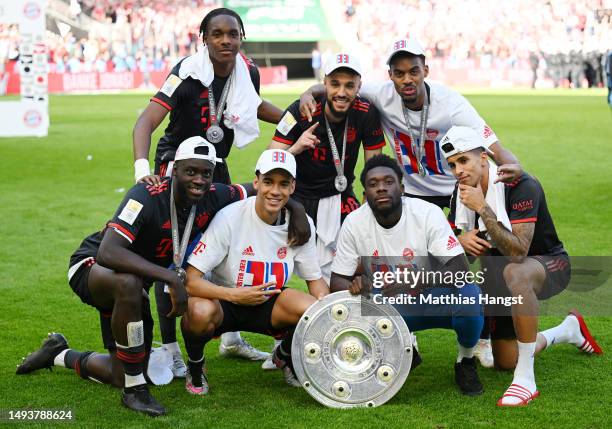 Dayot Upamecano, Mathys Tel, Jamal Musiala, Noussair Mazraoui, Alphonso Davies, Ryan Gravenberch and Joao Cancelo of FC Bayern Munich pose for a...