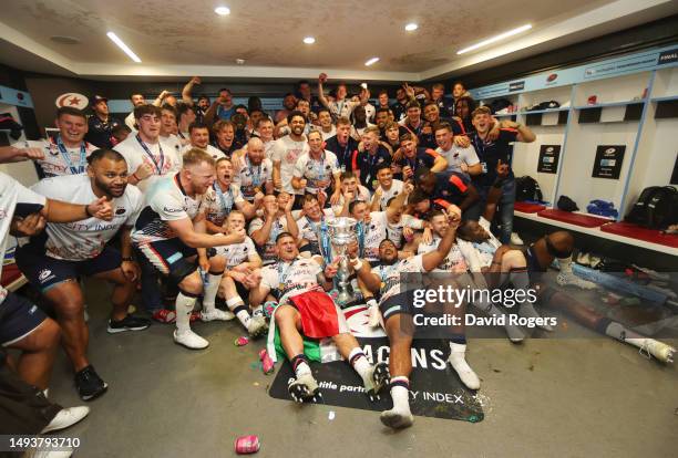 Saracens players celebrate in the dressing room after the team's victory during the Gallagher Premiership Final between Saracens and Sale Sharks at...