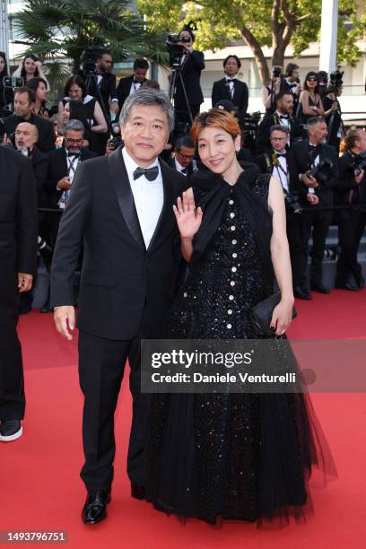 Hirokazu Koreeda and Sakura Andō attend the "Elemental" screening and closing ceremony red carpet during the 76th annual Cannes film festival at...