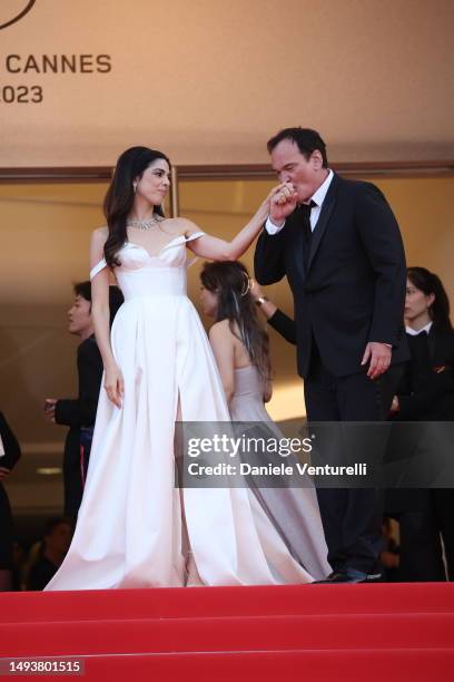 Daniella Pick and Quentin Tarantino attend the "Elemental" screening and closing ceremony red carpet during the 76th annual Cannes film festival at...