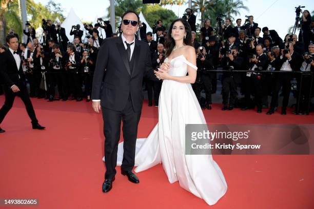 Quentin Tarantino and Daniella Pick attend the "Elemental" screening and closing ceremony red carpet during the 76th annual Cannes film festival at...