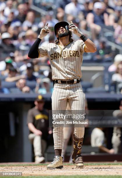 Fernando Tatis Jr. #23 of the San Diego Padres celebrates his fourth inning home run against the New York Yankees at home plate at Yankee Stadium on...