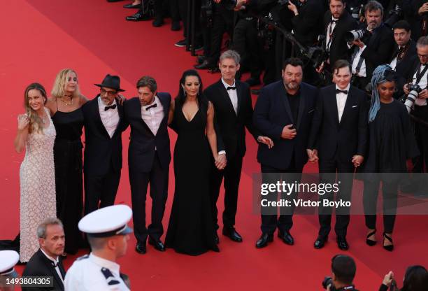 Jury members Brie Larson, Julia Ducournau, Atiq Rahimi, President of the Jury Ruben Östlund, Maryam Touzani, Damián Szifron, Denis Ménochet, Paul...