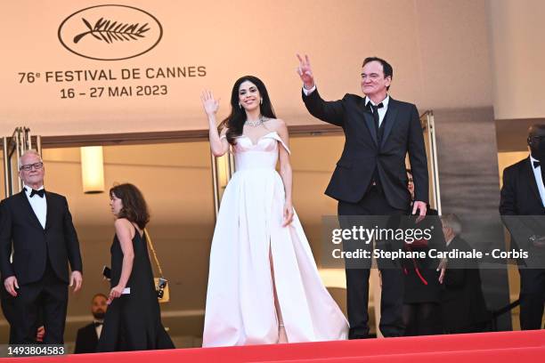 Daniella Pick and Quentin Tarantino attend the "Elemental" screening and closing ceremony red carpet during the 76th annual Cannes film festival at...