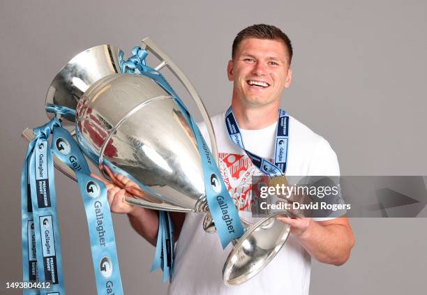 Owen Farrell of Saracens poses for a photo with the Gallagher Premiership trophy after the team's victory in the Gallagher Premiership Final between...