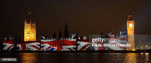 An image of the Union flag is projected on The Houses of Parliament in London on July 27 during the opening ceremony of the London 2012 Olympic...