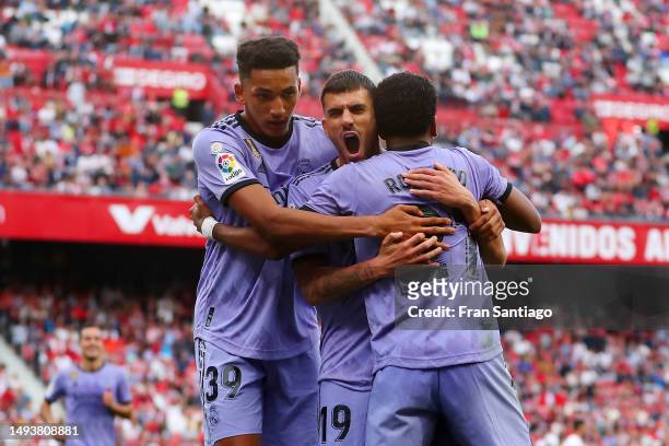 Rodrygo of Real Madrid celebrates with teammates Alvaro Rodriguez and Dani Ceballos after scoring the team's second goal during the LaLiga Santander...