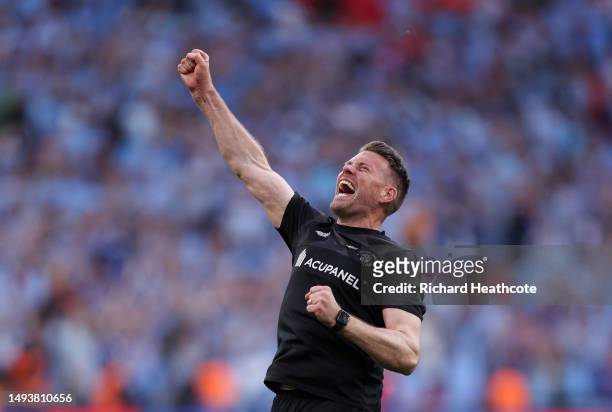 Rob Edwards, Manager of Luton Town, celebrates after Fankaty Dabo of Coventry City misses a penalty in the penalty shoot out which results in a...
