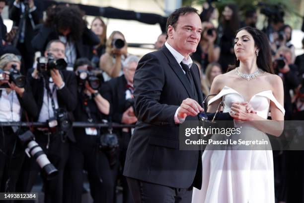 Quentin Tarantino and Daniella Pick attend the "Elemental" screening and closing ceremony red carpet during the 76th annual Cannes film festival at...