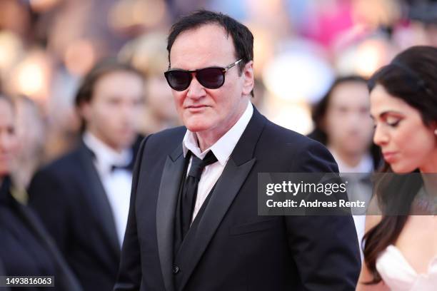 Quentin Tarantino and Daniella Pick attend the "Elemental" screening and closing ceremony red carpet during the 76th annual Cannes film festival at...