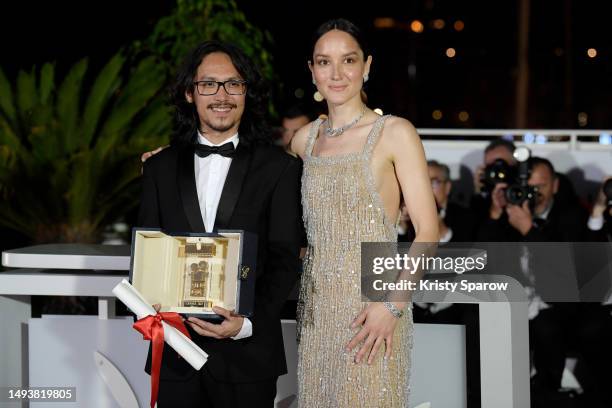 Director Pham Thien An poses with The Caméra d’or Award for 'Inside The Yellow Cocoon Shell' and President of the Camera d’Or Jury Anaïs Demoustier...