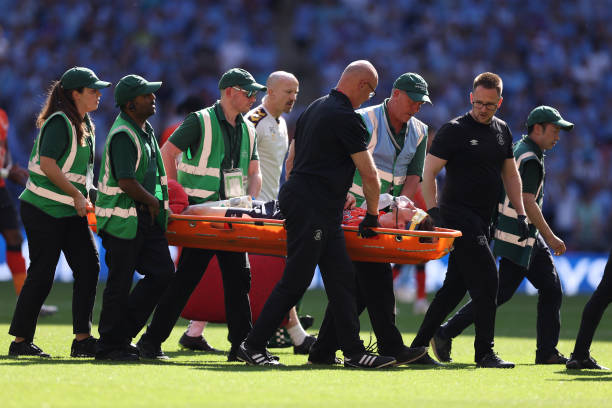 Tom Lockyer of Luton Town is stretchered off during the Sky Bet Championship Play-Off Final between Coventry City and Luton Town at Wembley Stadium...