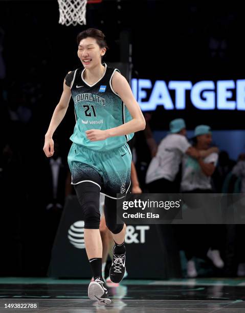 Han Xu of the New York Liberty celebrates her basket in the fourth quarter against the Connecticut Sun at Barclays Center on May 27, 2023 in the...