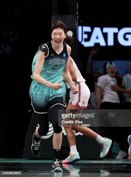 Han Xu of the New York Liberty celebrates her basket in the fourth quarter against the Connecticut Sun at Barclays Center on May 27, 2023 in the...