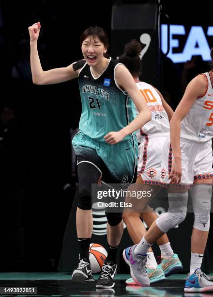 Han Xu of the New York Liberty celebrates her basket in the fourth quarter against the Connecticut Sun at Barclays Center on May 27, 2023 in the...