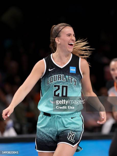 Sabrina Ionescu of the New York Liberty celebrates her three point shot in the second hal against the Connecticut Sun at Barclays Center on May 27,...