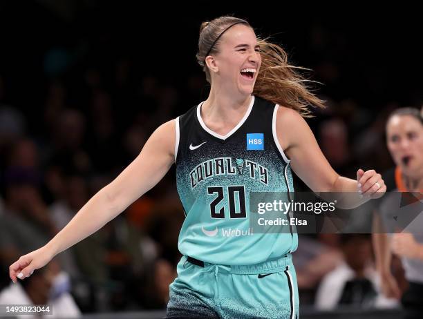 Sabrina Ionescu of the New York Liberty celebrates her three point shot in the second hal against the Connecticut Sun at Barclays Center on May 27,...