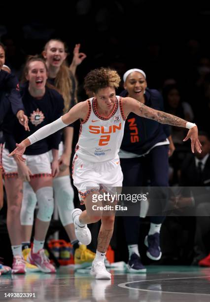 Natisha Hiedeman of the Connecticut Sun celebrates her three point shot in the first half against the New York Liberty at Barclays Center on May 27,...