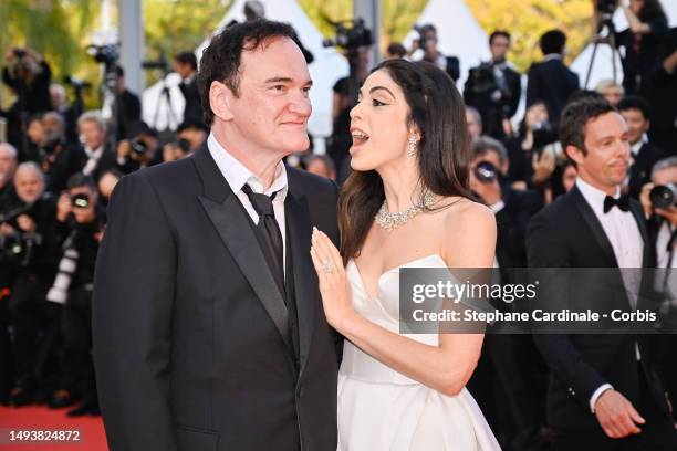 Quentin Tarantino and Daniella Pick attend the "Elemental" screening and closing ceremony red carpet during the 76th annual Cannes film festival at...