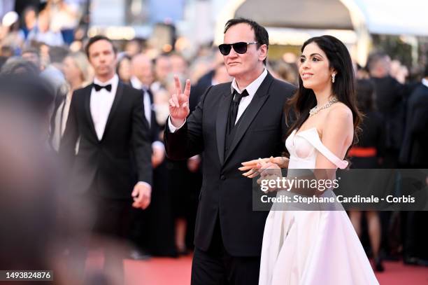 Quentin Tarantino and Daniella Pick attend the "Elemental" screening and closing ceremony red carpet during the 76th annual Cannes film festival at...