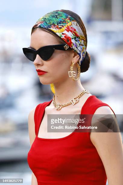 Model is walking the runway at the Dolce & Gabbana X Mytheresa capsule presentation on May 26, 2023 in Portofino, Italy.