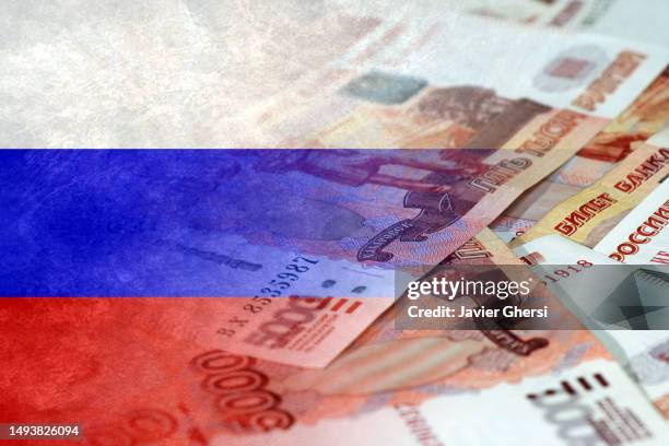 flag of russia and russian rubles in cash - budget committee stock pictures, royalty-free photos & images