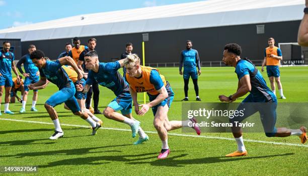 Players seen L-R Jamal Lewis, Miguel Almirón, Anthony Gordon and Jacob Murphy in a reaction drill during the Newcastle United Training Session at the...