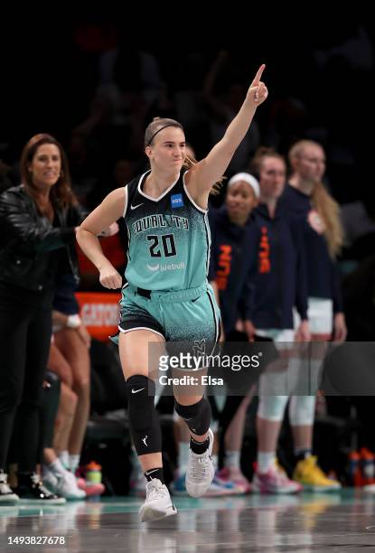 Sabrina Ionescu of the New York Liberty celebrates her three point shot in the second half against the Connecticut Sun at Barclays Center on May 27,...