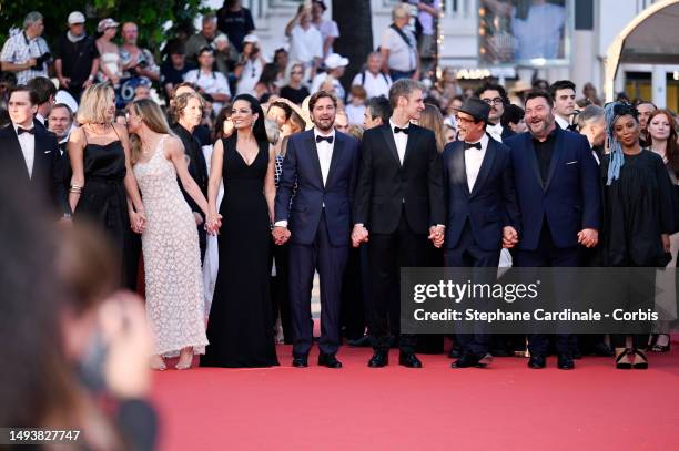 Jury members Paul Dano, Julia Ducournau, Brie Larson, Maryam Touzani, President of the Jury Ruben Östlund, Damián Szifron, Atiq Rahimi, Denis...