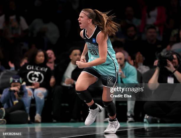 Sabrina Ionescu of the New York Liberty celebrates her shot in the third quarter against the Connecticut Sun at Barclays Center on May 27, 2023 in...