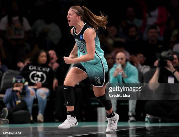 Sabrina Ionescu of the New York Liberty celebrates her shot in the third quarter against the Connecticut Sun at Barclays Center on May 27, 2023 in...