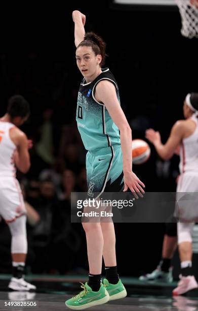 Breanna Stewart of the New York Liberty celebrates her three point shot in the second half against the Connecticut Sun at Barclays Center on May 27,...