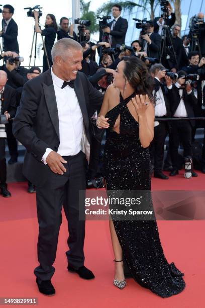 Samy Naceri and Sofia Athena attend the "Elemental" screening and closing ceremony red carpet during the 76th annual Cannes film festival at Palais...