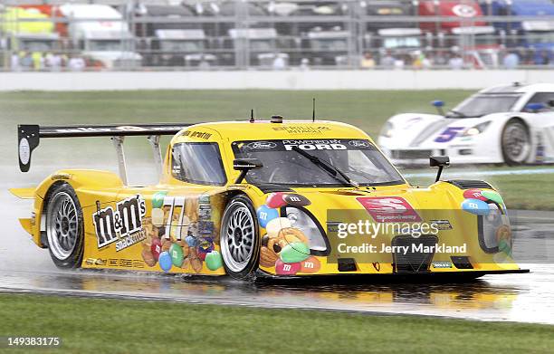 Jim Lowe and Paul Tracy drive the M&M's Snack Mix/Speedway during the Grand-Am Rolex Sports Car Series inaugural Brickyard Grand Prix at Indianapolis...