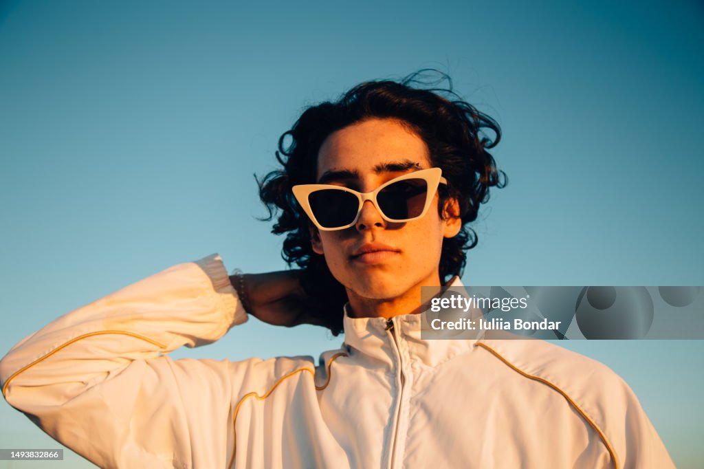 Young man with cool attitude outdoor portrait