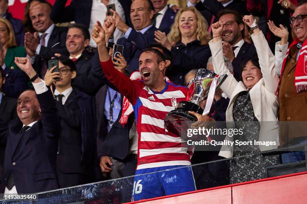 Victor Diaz, captain of Granada CF lifts the LaLiga Smartbank winner's trophy after the LaLiga Smartbank match between Granada CF and CD Leganes at...