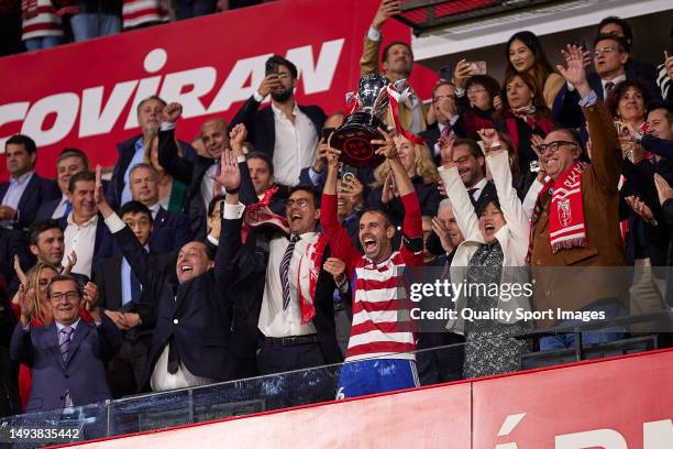 Victor Diaz, captain of Granada CF lifts the LaLiga Smartbank winner's trophy after the LaLiga Smartbank match between Granada CF and CD Leganes at...