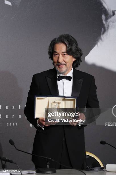 Koji Yakusho, Winner of the Best Actor Award for 'Perfect Days' attends the Palme D'Or winners press conference at the 76th annual Cannes film...