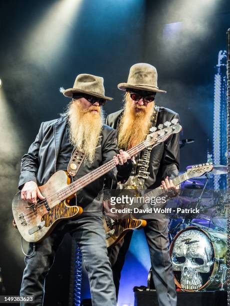 Dusty Hill and Billy Gibbons from ZZ Top perform at L'Olympia on July 27, 2012 in Paris, France.