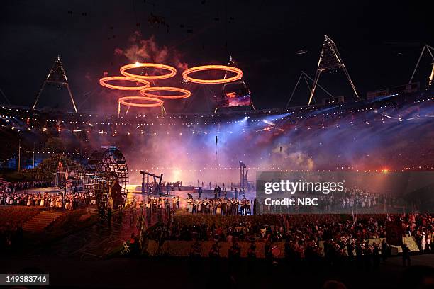 Opening Ceremony -- Pictured: Olympic Rings rise over Olympic Stadium during the 'Isles of Wonder' Opening Ceremony of the 2012 Summer Olympic Games...